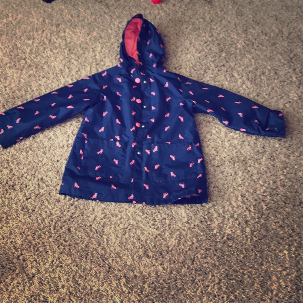 Dark blue raincoat with pink cat